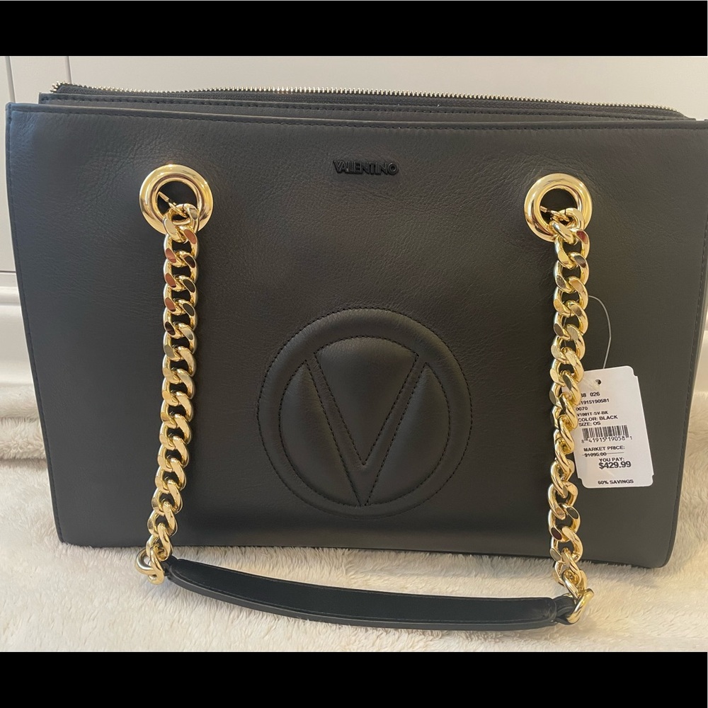 Valentino handbag, black with gold hardware.